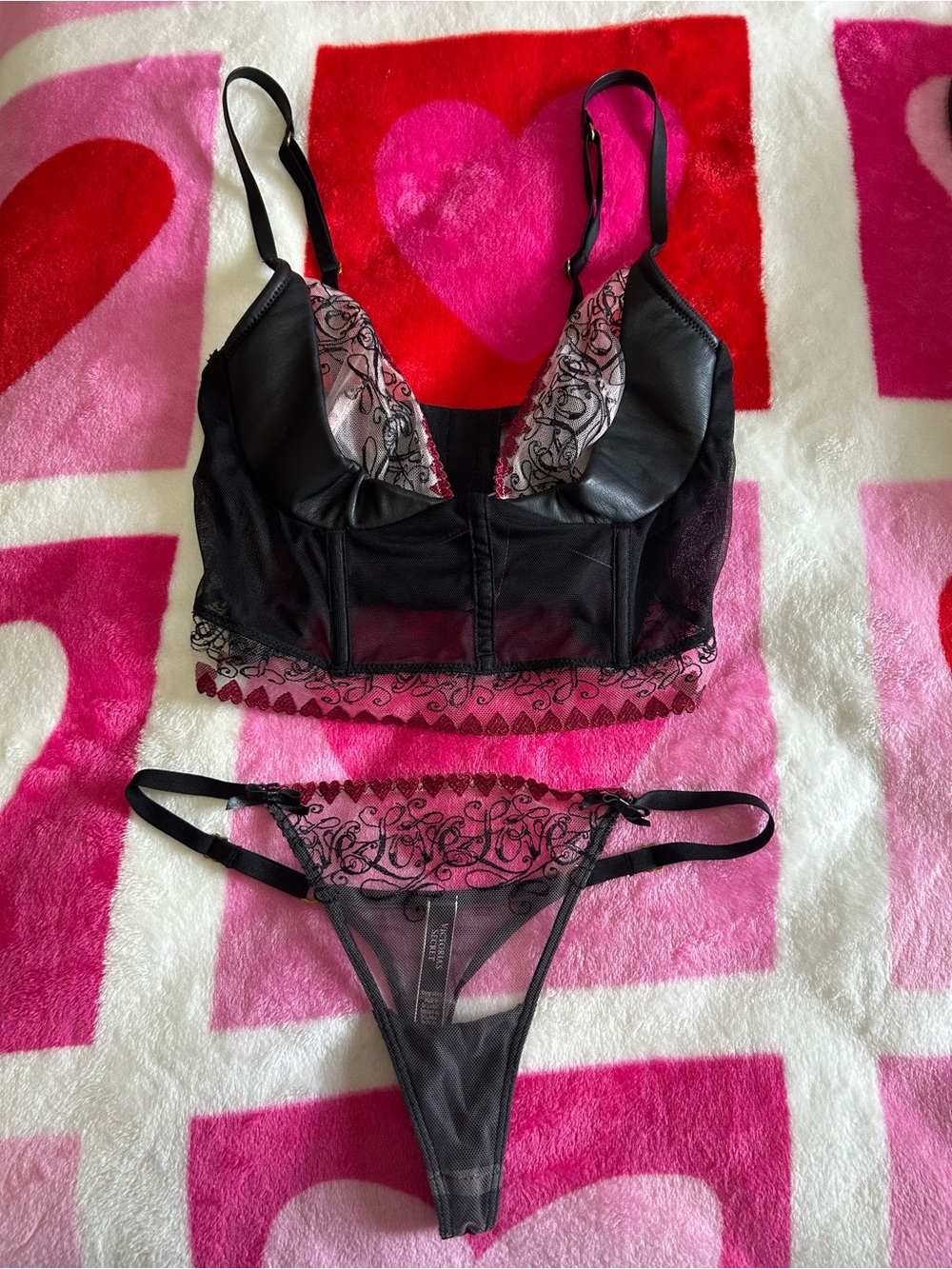 Victoria’s Secret faux leather and mesh bustier bra and thong set